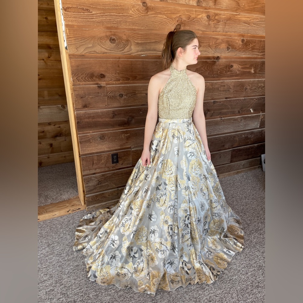 Jovani White Gold Beaded Bodice High Neck Evening Gown 58681
Size: 4